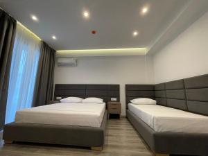 Postel nebo postele na pokoji v ubytování Hotel Mare 2