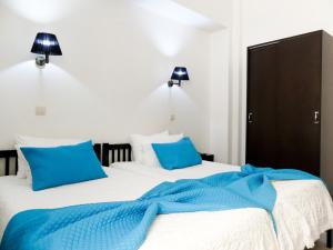 Postel nebo postele na pokoji v ubytování Hotel Cubata