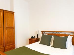 Postel nebo postele na pokoji v ubytování Hotel Cubata