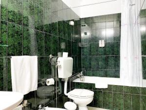 Koupelna v ubytování Hotel Cubata