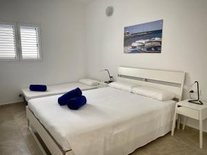 Postel nebo postele na pokoji v ubytování Apartamentos Anjomacar B