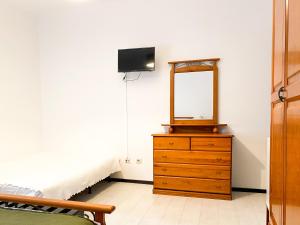 TV a/nebo společenská místnost v ubytování Hotel Cubata