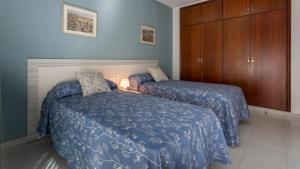 Posteľ alebo postele v izbe v ubytovaní APARTAMENTO SIMO B/G