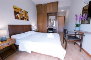 Voodi või voodid majutusasutuse Hotel Cronos toas