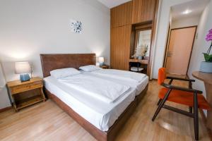 Voodi või voodid majutusasutuse Hotel Cronos toas