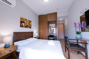 Voodi või voodid majutusasutuse Hotel Cronos toas