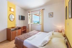 Posteľ alebo postele v izbe v ubytovaní Villa Anima in Makarska, private pool + 20 fotografií