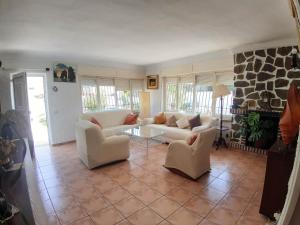 Posezení v ubytování Chalet Miraflores