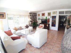 Posezení v ubytování Chalet Miraflores