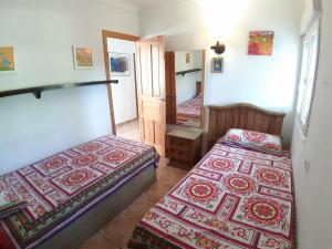 Postel nebo postele na pokoji v ubytování Chalet Miraflores
