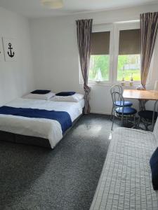 Postel nebo postele na pokoji v ubytování REDA - Pokoje z niezależnym wejściem