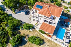 an overhead view of a house with an orange roof at Apartments Villa Made 4U in Mlini