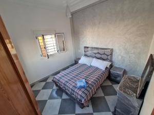 Postel nebo postele na pokoji v ubytování Appartement meublé à louer