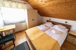 Ένα ή περισσότερα κρεβάτια σε δωμάτιο στο Villa Lotus