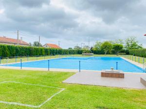 a large swimming pool in a yard at NEXT STOP PLAYA SALINAS in Salinas