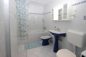 Kúpeľňa v ubytovaní Apartment Solman + 5 fotografií