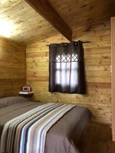 Postel nebo postele na pokoji v ubytování Resort Camping Solopuent + 37 fotografií