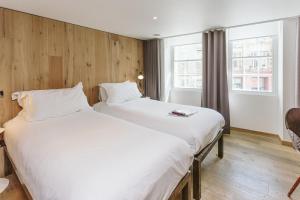 Voodi või voodid majutusasutuse Grassmarket Hotel toas