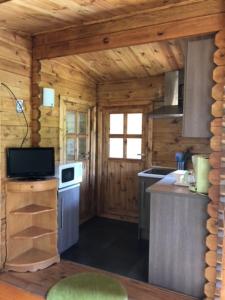 Kuchyň nebo kuchyňský kout v ubytování Resort Camping Solopuent