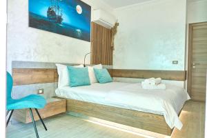 Ένα ή περισσότερα κρεβάτια σε δωμάτιο στο Blue Bamboo Apartment Spa Pools Resort and Parking +47 φωτογραφίες