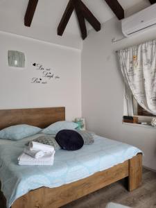 Posteľ alebo postele v izbe v ubytovaní Apartment LELA