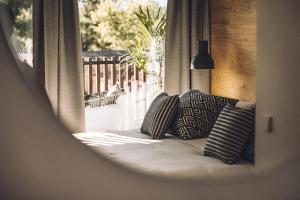 Postel nebo postele na pokoji v ubytování Las Gaviotas Suites Hotel & Spa