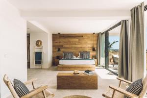 Postel nebo postele na pokoji v ubytování Las Gaviotas Suites Hotel & Spa