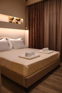 Posteľ alebo postele v izbe v ubytovaní Alto Suite (Cielo suites)