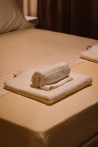 Posteľ alebo postele v izbe v ubytovaní Alto Suite (Cielo suites)