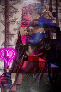 a painting of a woman holding a pink heart light at Hotel Indigo Madrid - Gran Vía by IHG in Madrid