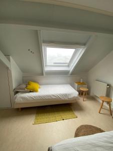 Een bed of bedden in een kamer bij Vakantiewoning in Middelburg Zeeland