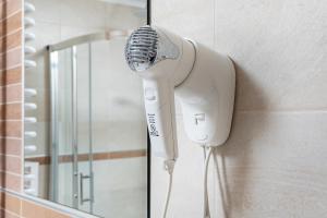 Kúpeľňa v ubytovaní Apartamenty Feniks by Noclegi Renters
