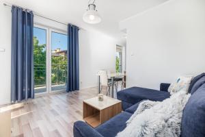 Posedenie v ubytovaní Apartamenty Feniks by Noclegi Renters