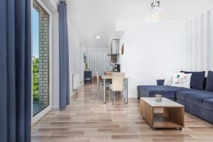 Posedenie v ubytovaní Apartamenty Feniks by Noclegi Renters