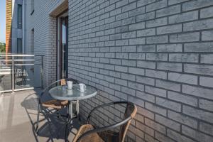 Balkón alebo terasa v ubytovaní Apartamenty Feniks by Noclegi Renters