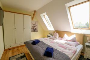 Łóżko lub łóżka w pokoju w obiekcie Iseroase House Deluxe