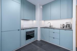 Ett kök eller pentry på Blue Sea Apartamenty Kasprowicza