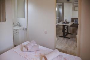 Postel nebo postele na pokoji v ubytování Mobile Homes Bilice