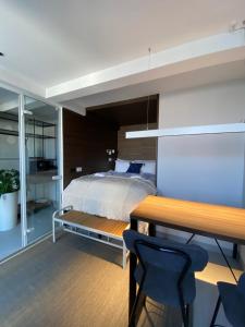 Postel nebo postele na pokoji v ubytování Korpa Deli Rooms SPA