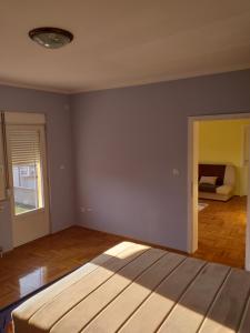 Postel nebo postele na pokoji v ubytování Alex-Branka apartments