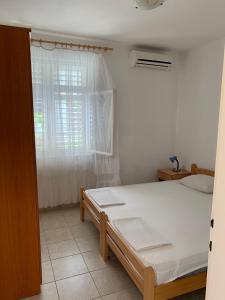 Postel nebo postele na pokoji v ubytování Anita Guest House