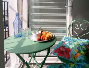 a table with a plate of food on a table at 107 Eglinton Street in Portrush