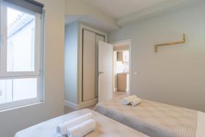Posteľ alebo postele v izbe v ubytovaní Urbe10 Angel Suites 2 Bedrooms Apartment 4A