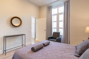 Postel nebo postele na pokoji v ubytování Urbe10 Angel Suites 1 Bedroom Apartment 3C