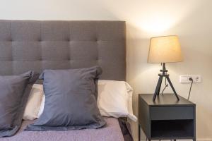 Postel nebo postele na pokoji v ubytování Urbe10 Angel Suites 1 Bedroom Apartment 3C