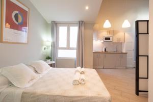 Posteľ alebo postele v izbe v ubytovaní Urbe10 Angel Suites Apartment 4B