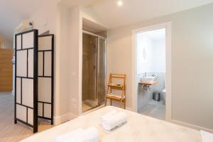 Posteľ alebo postele v izbe v ubytovaní Urbe10 Angel Suites Apartment 4B