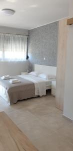 Posteľ alebo postele v izbe v ubytovaní AVR Airport Deluxe Suites 6 AIRPORT FREE SHUTLE
