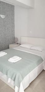 Posteľ alebo postele v izbe v ubytovaní AVR Airport Deluxe Suites 6 AIRPORT FREE SHUTLE