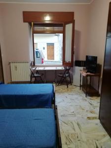 A television and/or entertainment centre at Casa Ai Cappuccini